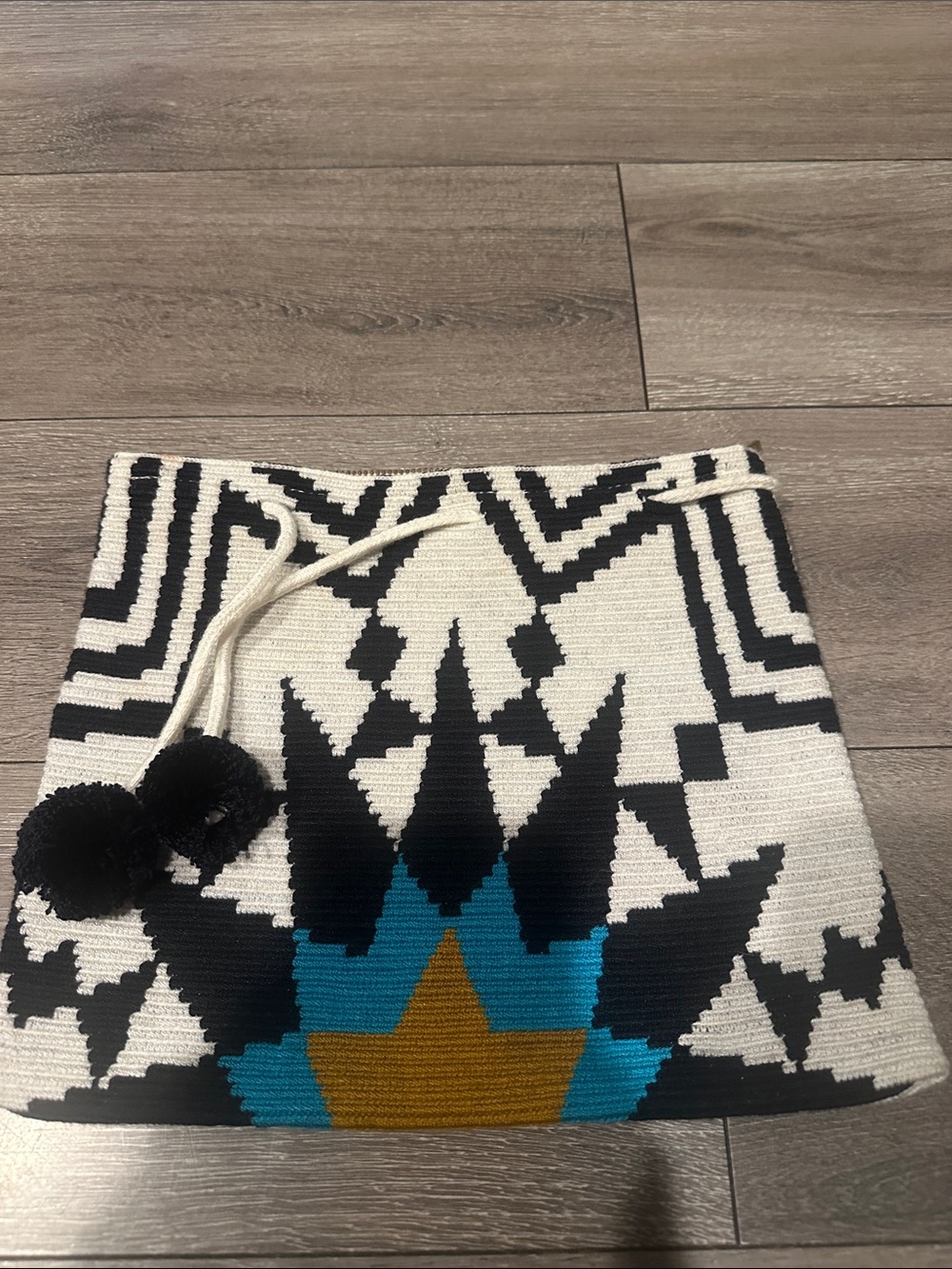 Sophie Anderson woven clutch bag.